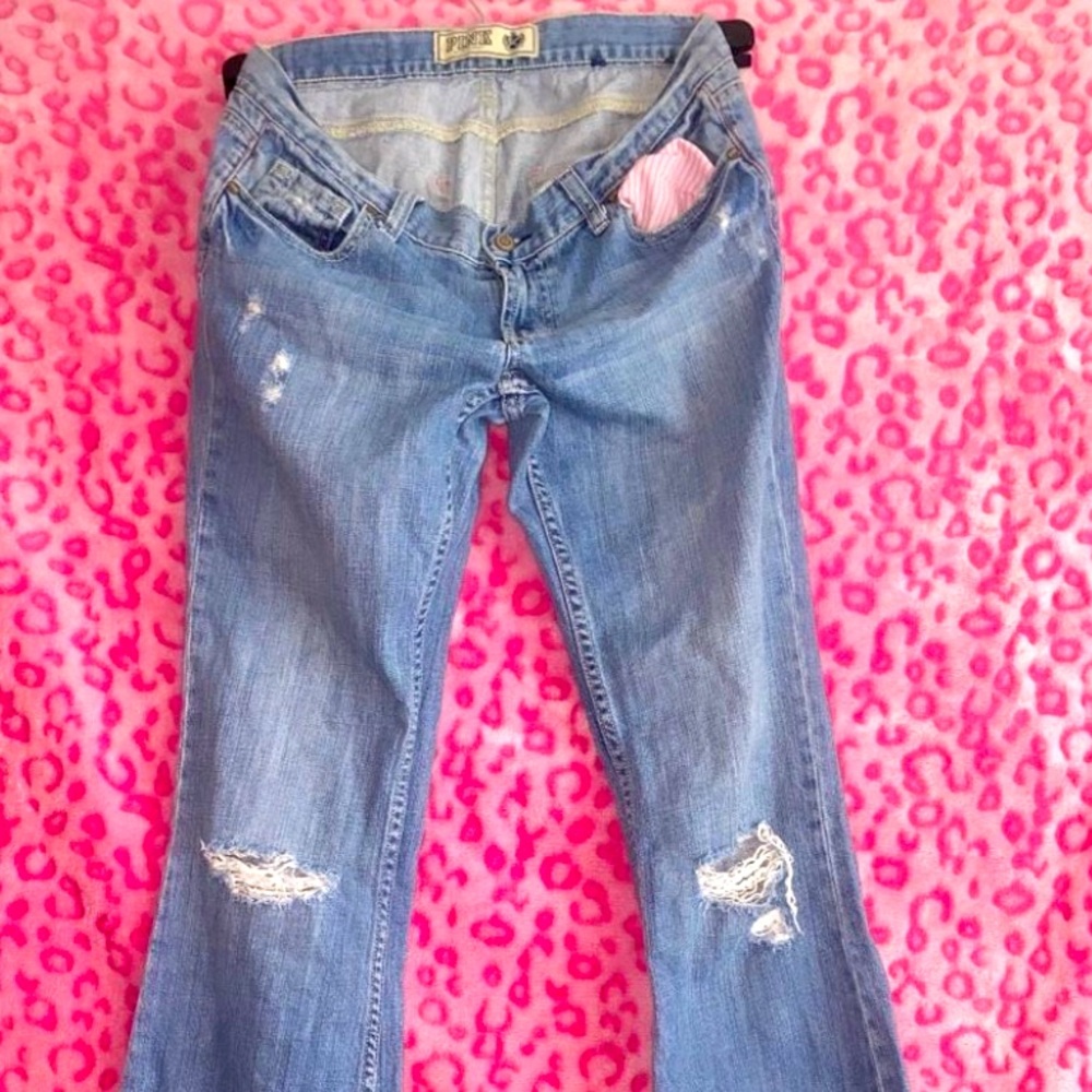 Light washed Victoria secret jeans pink stitching along the sides